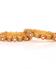 Peculiar Gold Bangles